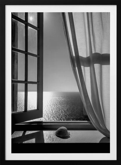 A serene black and white photograph looking out an open paned window at a sunlit ocean. A single seashell rests on the windowsill in the foreground, with shadows cast by the window frame. A light curtain hangs to the right, framing the tranquil sea view. Poster