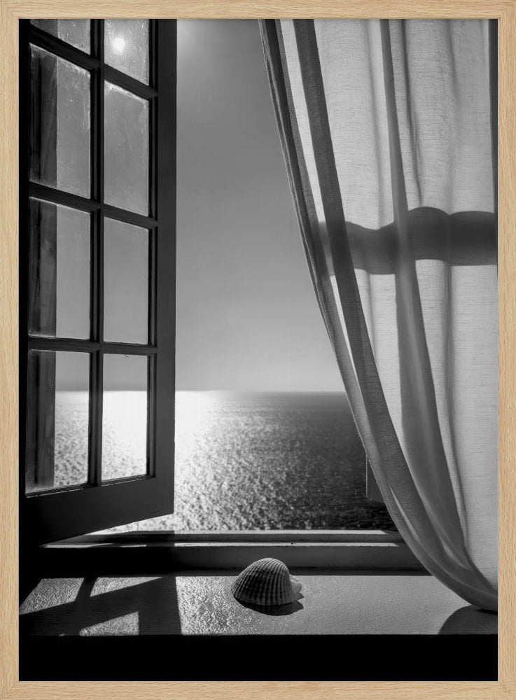 A serene black and white photograph looking out an open paned window at a sunlit ocean. A single seashell rests on the windowsill in the foreground, with shadows cast by the window frame. A light curtain hangs to the right, framing the tranquil sea view. Poster
