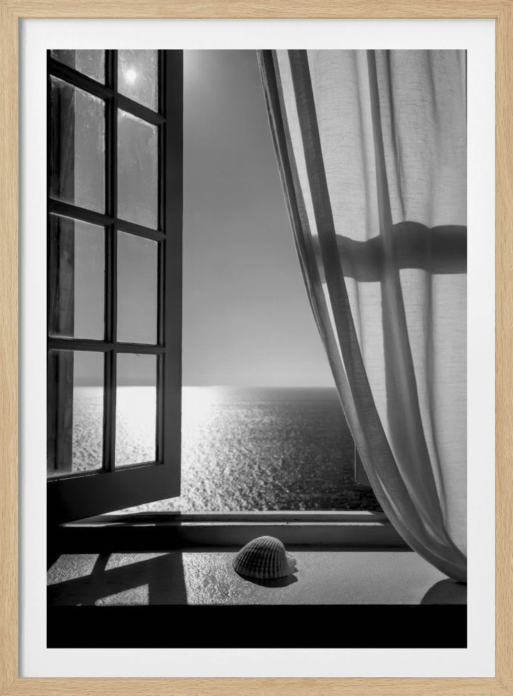 A serene black and white photograph looking out an open paned window at a sunlit ocean. A single seashell rests on the windowsill in the foreground, with shadows cast by the window frame. A light curtain hangs to the right, framing the tranquil sea view. Poster