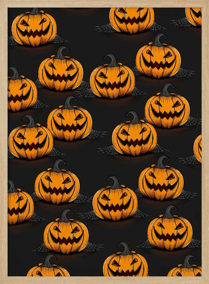 A framed poster featuring a repeating pattern of cartoonish, grinning jack-o'-lanterns on a solid black background. Each orange pumpkin has a sinister smile, triangular eyes, and a dark, curved stem. Faint spiderwebs are visible behind some of the pumpkins, adding to the spooky Halloween theme. Poster