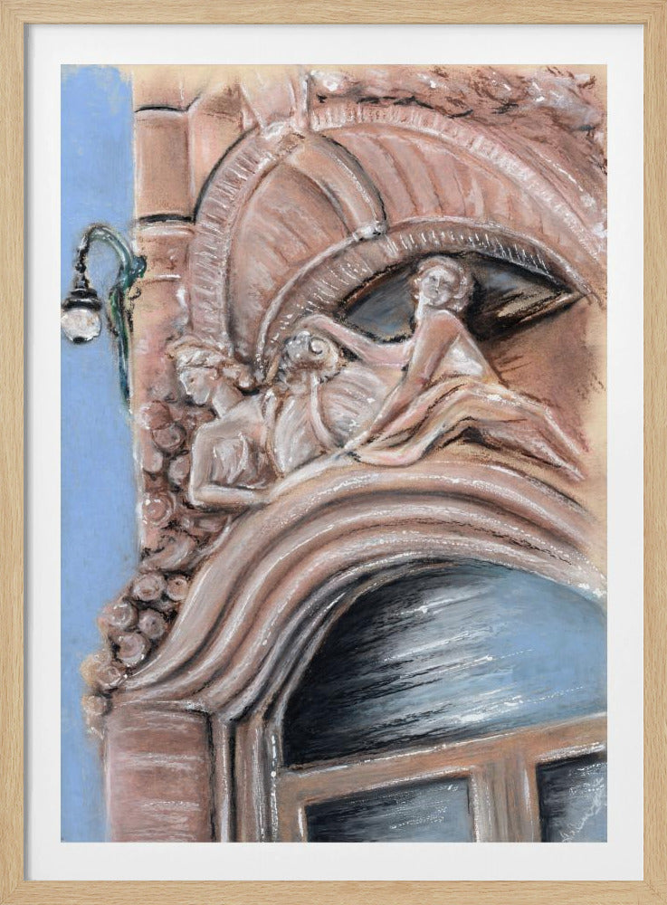 A pastel drawing of an ornate architectural detail on a building facade, featuring elaborate carvings above an arched window. The carvings depict classical female figures in flowing drapery, rendered in warm pink and brown tones against a light blue sky. A vintage-style street lamp is visible to the left. Wall Art