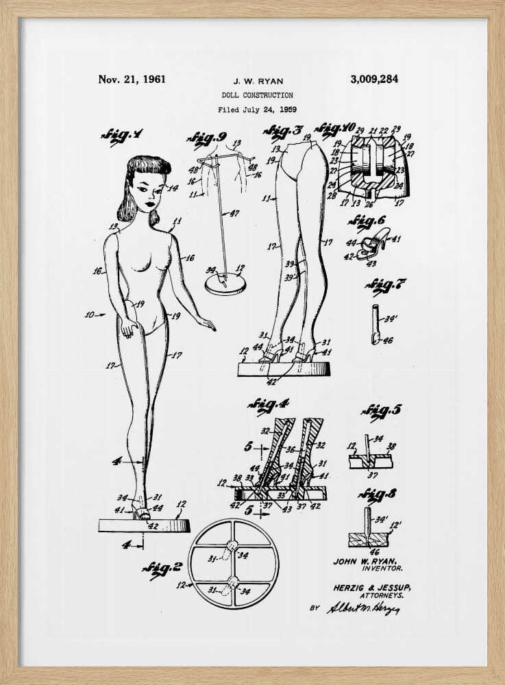 A framed black and white patent illustration for the original Barbie doll, dated November 21, 1961. The diagram, titled 'Doll Construction' by J. W. Ryan, shows various figures including a full view of the doll, cross-sections of its joints, and detailed drawings of its stand and shoes. Print