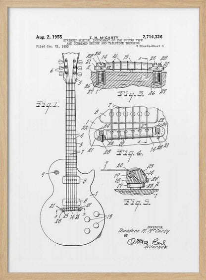 A framed black and white patent illustration for a stringed musical instrument, specifically an electric guitar, filed in 1953 by T. M. McCarty. The poster displays detailed schematic drawings of the guitar's body, neck, and close-ups of the combined bridge and tailpiece. Artwork