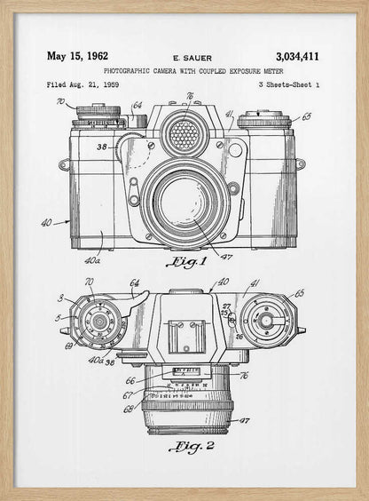 A framed black and white patent illustration of a vintage camera from 1962. It shows two detailed technical drawings, a front view and a top-down view, with numbered parts. Text at the top reads 'May 15, 1962', 'E. SAUER', and the patent number '3,034,411'. Wall Art