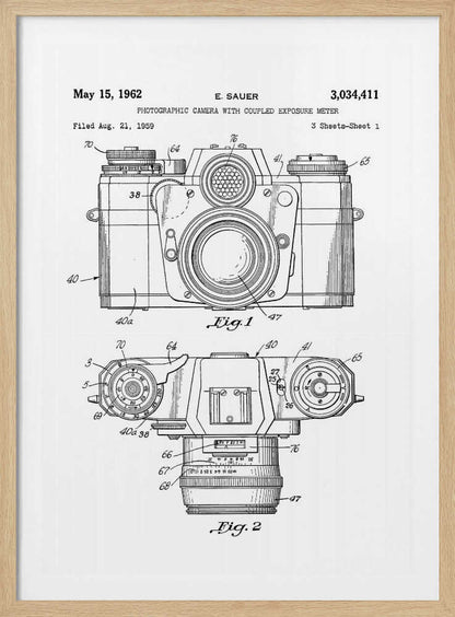 A framed black and white patent illustration of a vintage camera from 1962. It shows two detailed technical drawings, a front view and a top-down view, with numbered parts. Text at the top reads 'May 15, 1962', 'E. SAUER', and the patent number '3,034,411'. Wall Art