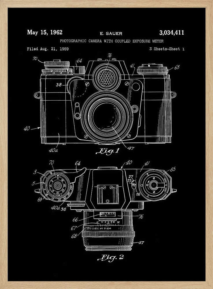 A framed patent illustration of a photographic camera from 1962, presented as a white line drawing on a black background. The poster shows two figures: Fig. 1 is a front view of the camera, and Fig. 2 is a top-down view. Both diagrams are detailed with numbers and lines pointing to various components. The top of the poster includes text with the patent date, inventor's name (E. Sauer), and patent number. Poster