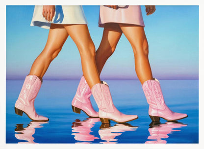 A pop art style painting of the legs of two women wearing matching pink cowboy boots and short skirts, walking across a reflective blue surface that mirrors their steps. The background is a gradient of blue and lavender, and the entire image is contained within a silver frame. Wall Art