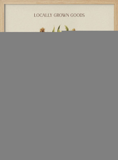 A vintage-style art print with a black frame featuring a wicker basket full of ears of corn. The poster has text that reads 'LOCALLY GROWN GOODS' at the top and 'FARMERS MARKET AUTUMN CORN COLLECTION' at the bottom. The background is a light cream color. Artwork