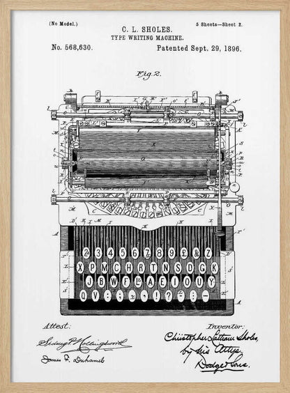 A framed black and white patent illustration of a C. L. Sholes typewriter, patented September 29, 1896. The detailed schematic shows the front view of the machine, including its complex inner workings and an unconventional keyboard layout, with signatures below. Print