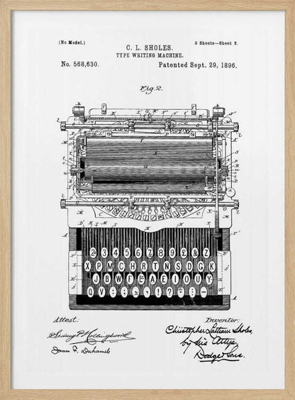 A framed black and white patent illustration of a C. L. Sholes typewriter, patented September 29, 1896. The detailed schematic shows the front view of the machine, including its complex inner workings and an unconventional keyboard layout, with signatures below. Print
