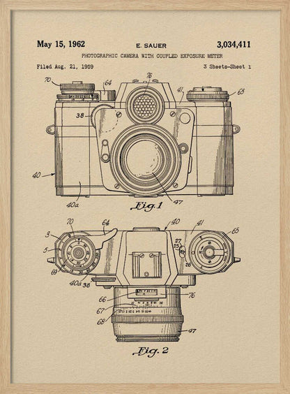 A framed vintage patent illustration from 1962 for a photographic camera with an exposure meter, showing detailed front and top-down technical drawings in black ink on aged beige paper. Decor