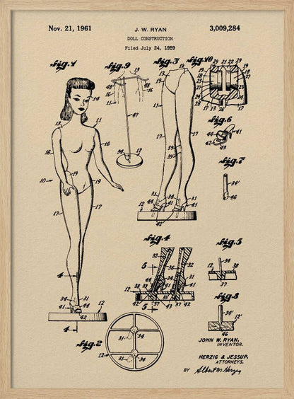 A framed vintage patent print for a 'Doll Construction' from 1961, showing detailed schematic drawings of a female doll resembling the original Barbie. The print is on beige paper with black ink and has a black frame. Wall Art