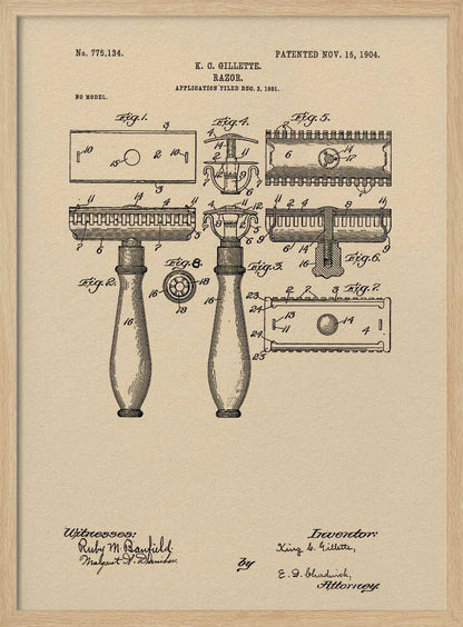 A framed vintage patent illustration for a razor invented by K. C. Gillette, dated November 15, 1904. The technical drawing on a beige background shows various figures and parts of the safety razor, with handwritten-style text and signatures at the bottom. Poster