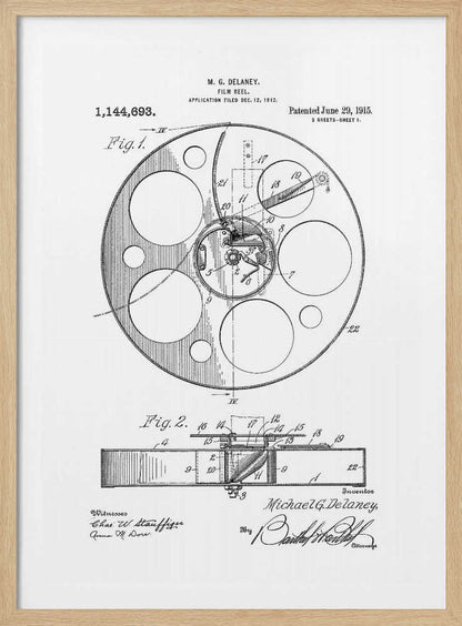 A framed black and white patent illustration for a film reel by M. G. Delaney, patented on June 29, 1915. The technical drawing shows a top view and a cross-section of the film reel, complete with part numbers, inventor's signature, and patent information. Poster