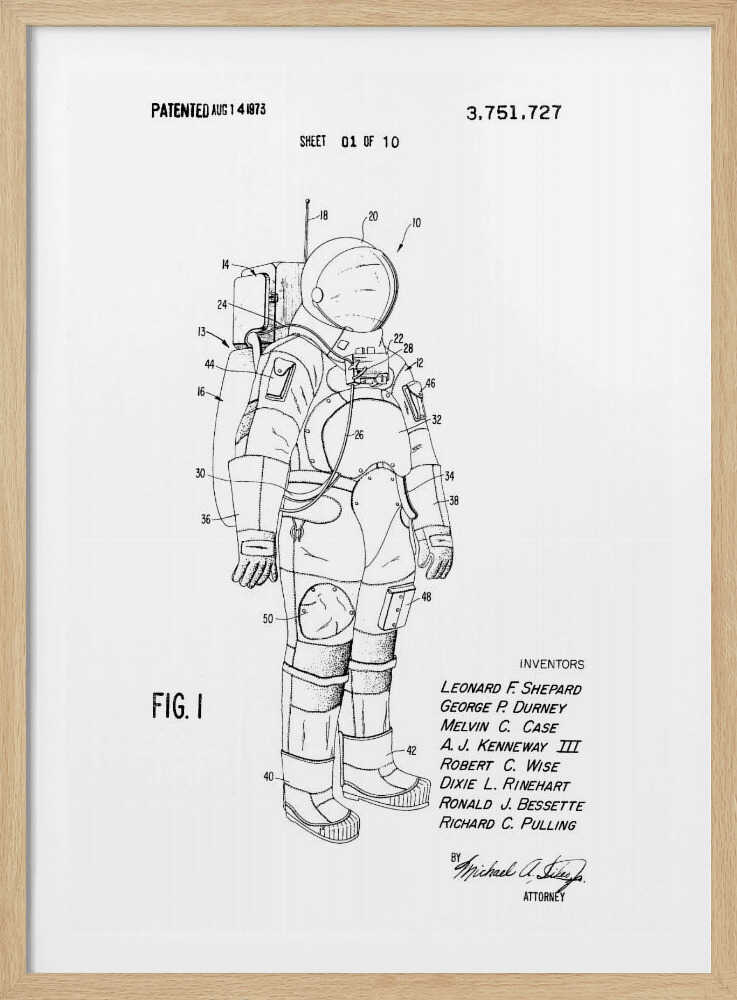 A framed black and white print of a United States patent document for a space suit, dated August 14, 1973. The print features a detailed technical line drawing of an astronaut in a full space suit, with various parts labeled with numbers. Text at the top indicates it is patent number 3,751,727, and at the bottom lists the inventors. Print