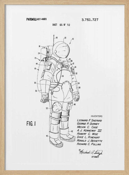 A framed black and white print of a United States patent document for a space suit, dated August 14, 1973. The print features a detailed technical line drawing of an astronaut in a full space suit, with various parts labeled with numbers. Text at the top indicates it is patent number 3,751,727, and at the bottom lists the inventors. Print
