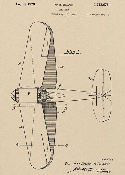 A framed vintage patent illustration of an airplane designed by W. D. Clark, dated August 6, 1929. The image shows a top-down schematic view of the aircraft in black ink on an aged, beige paper background, with various parts labeled with numbers. Text and signatures are visible, characteristic of an official patent document. Decor