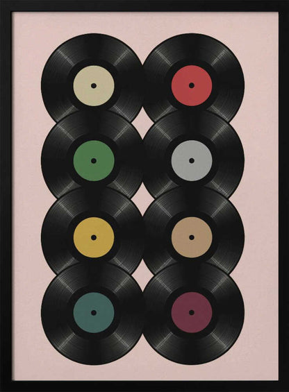 A graphic art print featuring eight black vinyl records arranged in two columns of four against a pale pink background. Each record has a different solid-colored label, creating a colorful and retro pattern. The artwork is enclosed in a simple black frame. Artwork