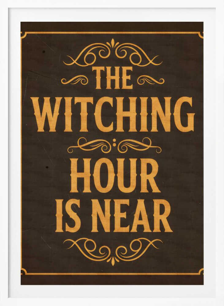 A framed vintage-style sign with a dark brown, distressed background. In a bold, golden-yellow serif font, the text reads 'THE WITCHING HOUR IS NEAR'. The text is adorned with ornate, swirling flourishes above, between, and below the lines. A thin golden-yellow border frames the entire design. Poster