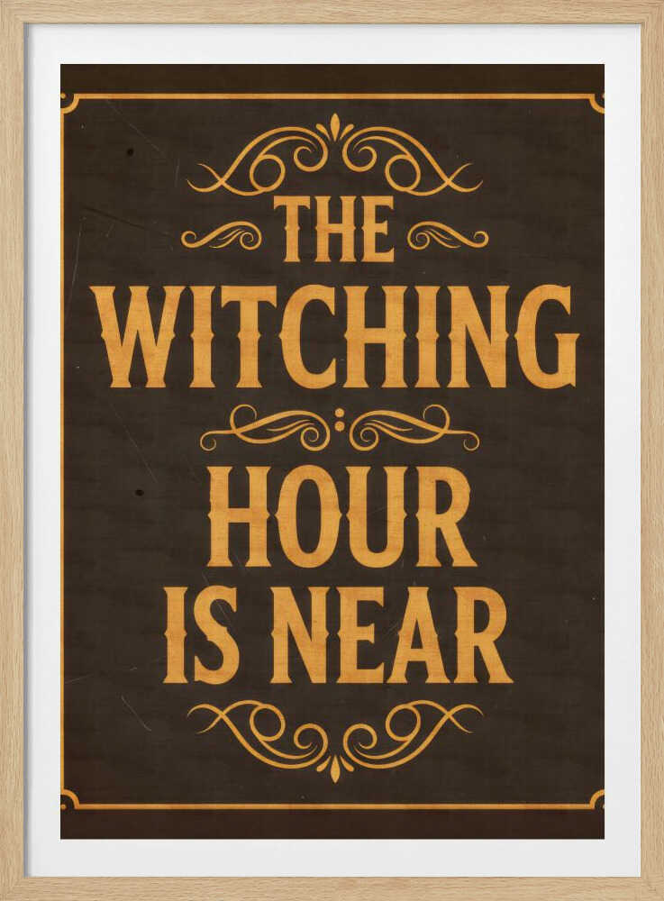A framed vintage-style sign with a dark brown, distressed background. In a bold, golden-yellow serif font, the text reads 'THE WITCHING HOUR IS NEAR'. The text is adorned with ornate, swirling flourishes above, between, and below the lines. A thin golden-yellow border frames the entire design. Poster
