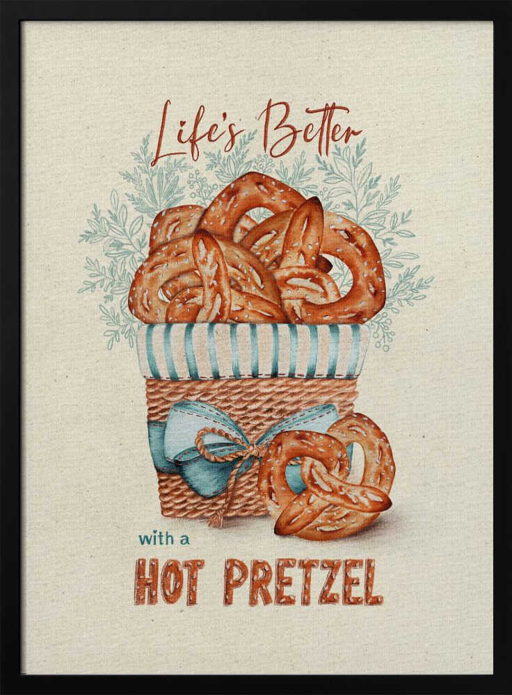 A vintage-style framed artwork featuring a watercolor illustration of a wicker basket overflowing with golden-brown pretzels. The text reads 'Life's Better with a HOT PRETZEL' in a warm brown font against a cream-colored textured background. A blue ribbon is tied around the basket, and light blue foliage is visible behind it. Poster