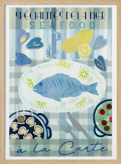 A vintage-style illustrated poster advertising seafood with French text. It features a platter with a whole blue fish and lemon slices on a blue and white checkered tablecloth, surrounded by mussels, shrimp, lemons, a pan of scallops, and a salad. Artwork