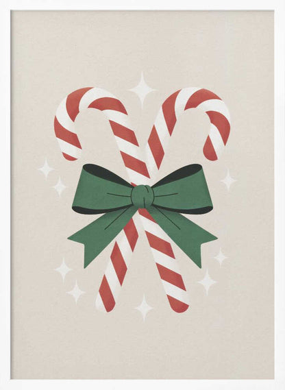 An illustration of two red-and-white striped candy canes crossed and tied together with a large green bow. The background is a soft beige color with small, white, four-pointed star sparkles. The artwork is shown in a black frame. Decor