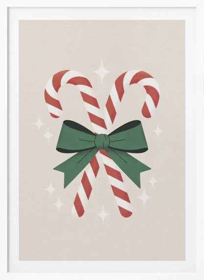 An illustration of two red-and-white striped candy canes crossed and tied together with a large green bow. The background is a soft beige color with small, white, four-pointed star sparkles. The artwork is shown in a black frame. Decor