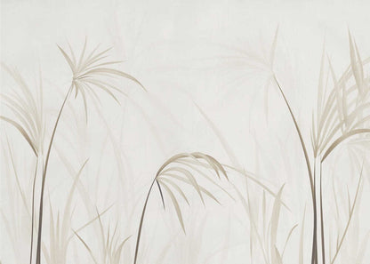 Minimalist art print of delicate beige grasses and reeds on a light background, framed in silver.