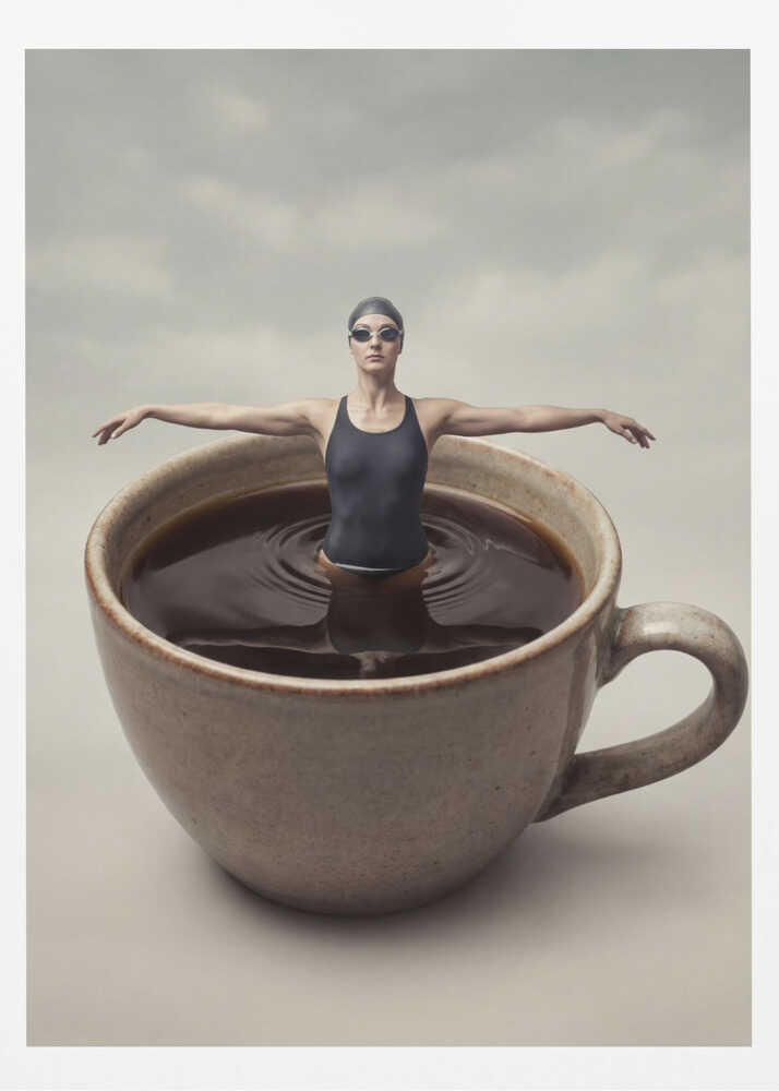 Surreal art print of a woman in a swimsuit swimming in a giant cup of coffee.