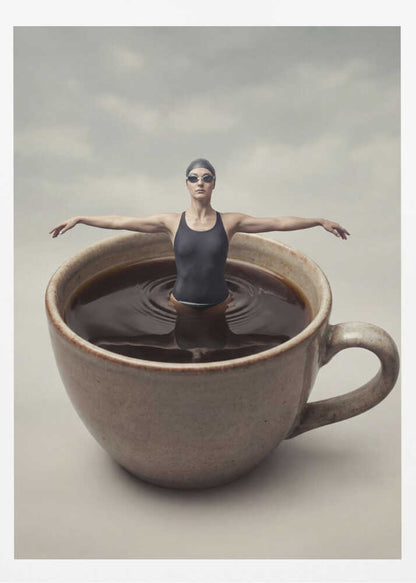 Surreal art print of a woman in a swimsuit swimming in a giant cup of coffee.