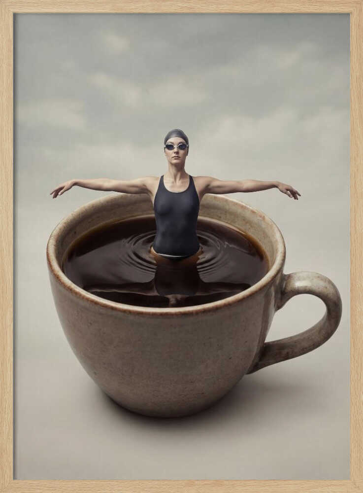 Surreal art print of a woman in a swimsuit swimming in a giant cup of coffee.