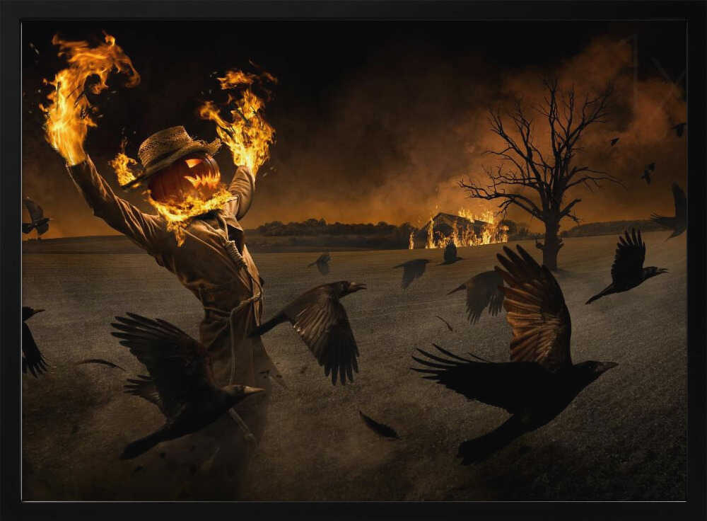 A terrifying scarecrow with a glowing jack-o'-lantern for a head stands in a dark field, its hands engulfed in flames raised towards the sky. A flock of black crows flies around it in a frenzy, while in the background, a barn burns under a dark, smoky orange sky. Wall Art