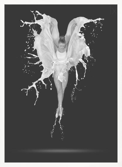 A dramatic black and white photograph of a ballerina suspended in mid-air against a black background. She is en pointe, and a dynamic splash of white liquid surrounds her, creating the illusion of wings. Artwork