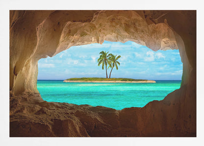 A framed artwork depicting a view from inside a rocky cave looking out at a small tropical island with two palm trees. The cave's natural arch frames the vibrant turquoise ocean and the bright blue sky, creating a sense of a hidden paradise. Artwork