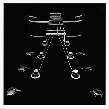 A dramatic, low-angle, black and white photograph of an electric guitar. The perspective looks up from the headstock, with the shiny tuning pegs and strings creating strong leading lines towards the fretboard and body, which are outlined in white against a solid black background. Poster