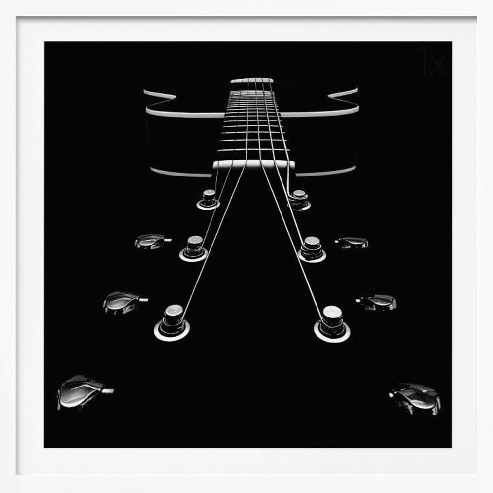 A dramatic, low-angle, black and white photograph of an electric guitar. The perspective looks up from the headstock, with the shiny tuning pegs and strings creating strong leading lines towards the fretboard and body, which are outlined in white against a solid black background. Poster