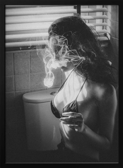 A black and white photograph of a woman in a bikini top smoking a cigarette in a bathroom. Light from a window with blinds creates dramatic shadows as a thick cloud of smoke obscures her face. Poster
