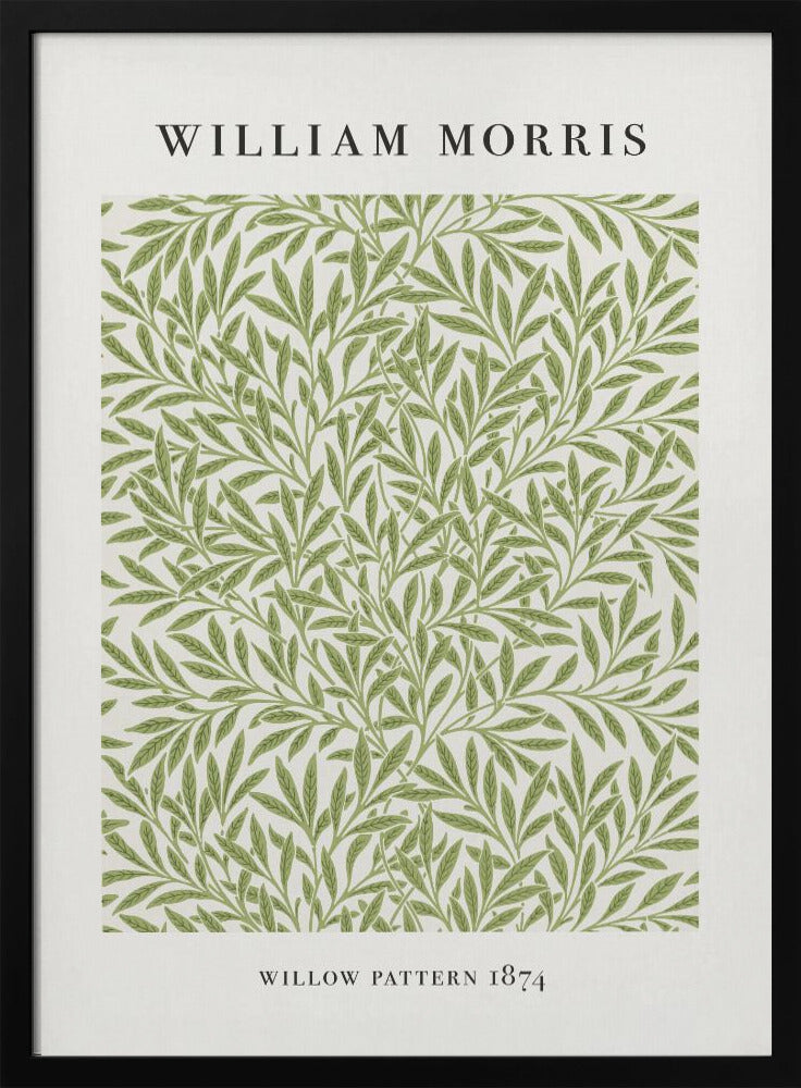 A framed art print of William Morris's 'Willow Pattern 1874'. The print features an intricate, repeating pattern of green willow branches and leaves on an off-white background, with the artist's name and pattern title in black text above and below the design. Print