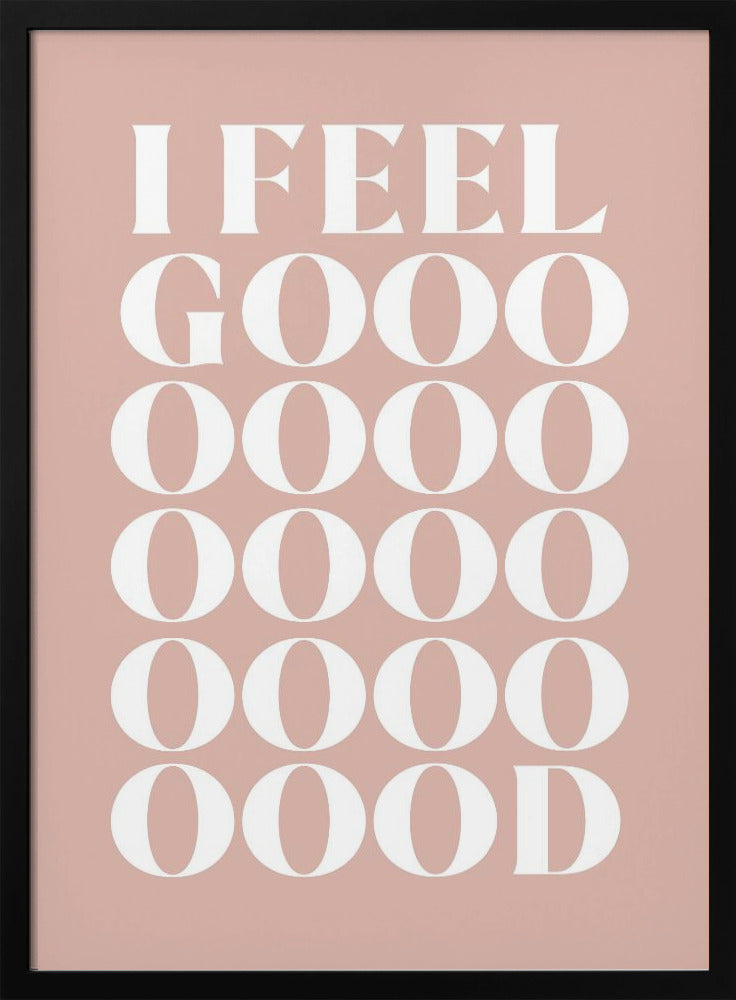 A framed typographic poster featuring the words 'I FEEL GOOOOOD' in a large, white serif font against a dusty pink background. The word 'GOOD' is stylized and stretched vertically with multiple rows of the letter 'O'. Artwork