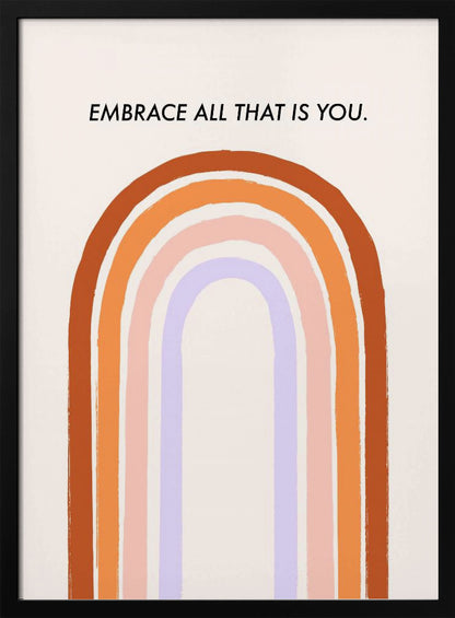 A framed art print with an inspirational quote. On a cream background, the black text reads 'EMBRACE ALL THAT IS YOU.' Below the text is a large, stylized U-shaped rainbow with thick, painted bands of terracotta, orange, pink, and lavender. Print