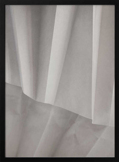 Abstract art print of folded white fabric or paper creating soft lines and deep shadows.