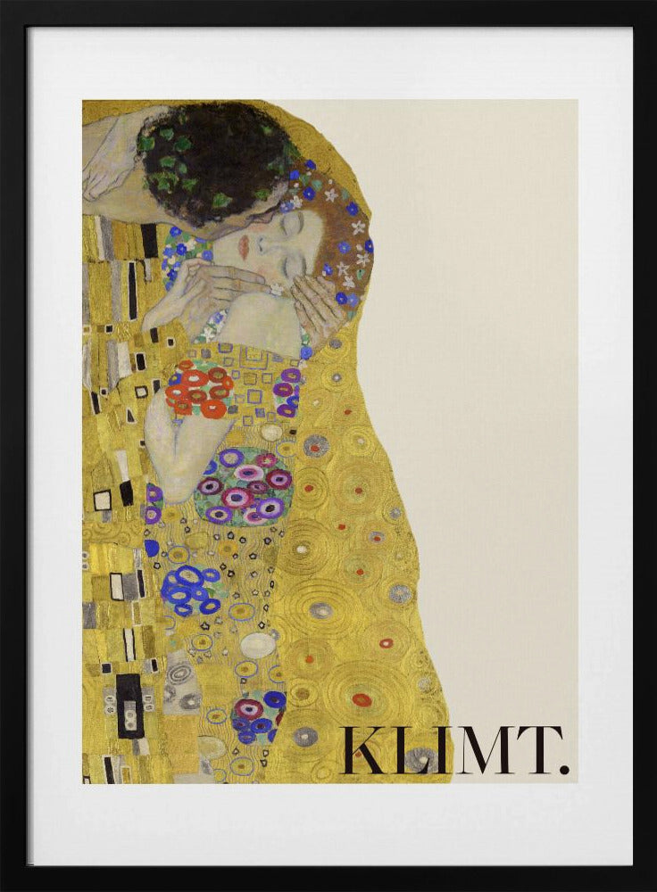 A framed art print of Gustav Klimt's 'The Kiss'. A couple embraces in ornate golden robes against a shimmering gold background. The poster includes the artist's name 'KLIMT.' in the lower right. Decor