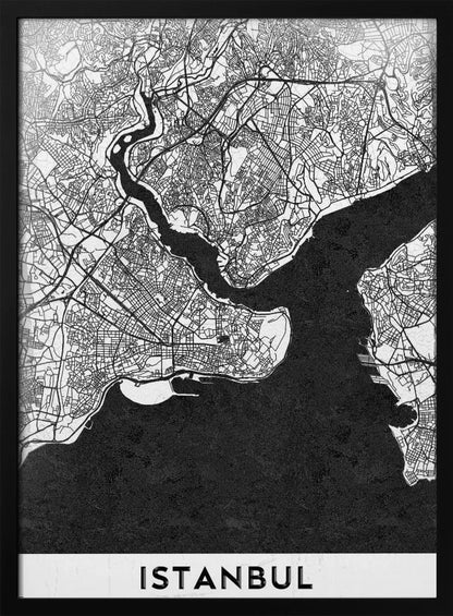 A modern black and white framed poster of a city map of Istanbul. The land is depicted in white with intricate black lines representing streets, while the bodies of water like the Bosphorus are shown in solid textured black. A white banner at the bottom displays the word 'ISTANBUL' in a bold, black, sans-serif font. Artwork
