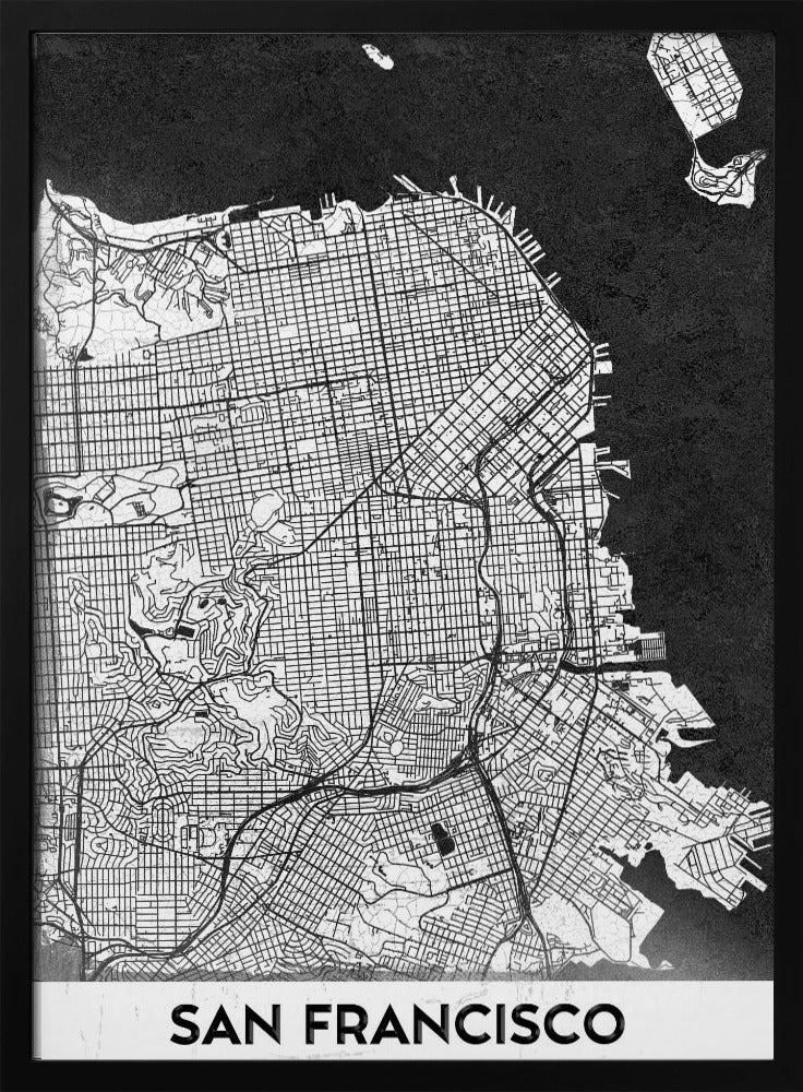 A minimalist black and white art print of a San Francisco city map. The street grid and landmass are depicted in white with fine black lines, set against a solid black background representing the water. A black frame surrounds the map, and a white banner at the bottom displays the text 'SAN FRANCISCO' in a bold, black font. Wall Art