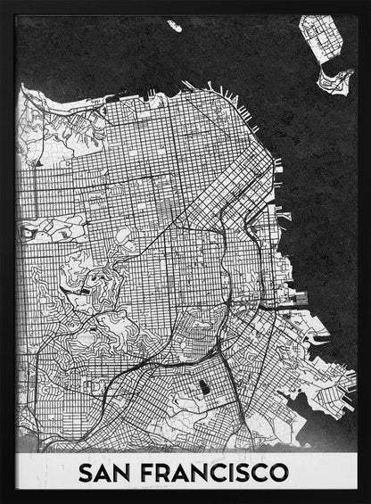 A minimalist black and white art print of a San Francisco city map. The street grid and landmass are depicted in white with fine black lines, set against a solid black background representing the water. A black frame surrounds the map, and a white banner at the bottom displays the text 'SAN FRANCISCO' in a bold, black font. Wall Art