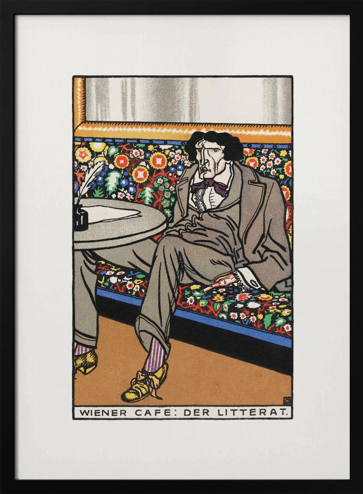 A framed art print titled 'Wiener Cafe: Der Litterat', depicting a stylized illustration of a writer in a Viennese cafe. The man, with a gaunt face and dark hair, sits on a brightly colored, floral-patterned bench, wearing a grey suit, striped socks, and yellow shoes. A table beside him holds an inkwell and quill. Decor