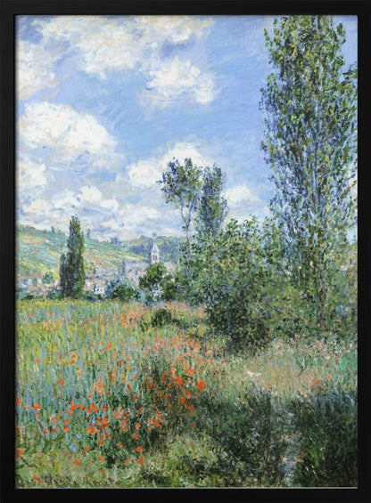 An impressionist painting depicting a vibrant green field filled with red poppies under a bright blue sky with fluffy white clouds. Tall green trees stand on the right, and in the distance, a small village with a church steeple is nestled in the rolling hills. Decor