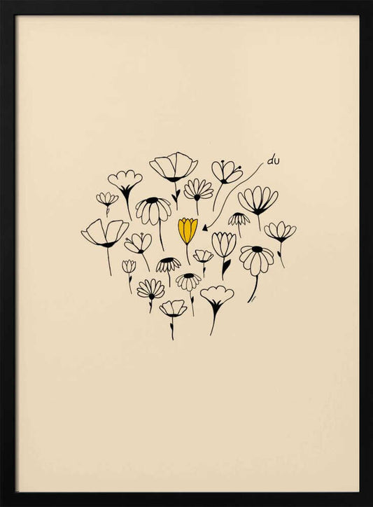 A minimalist art print with a cream-colored background and a thin black frame. In the center is a circular cluster of hand-drawn wildflowers in black ink, with one single flower colored a vibrant yellow, creating a pop of color. The style is simple and whimsical. Print