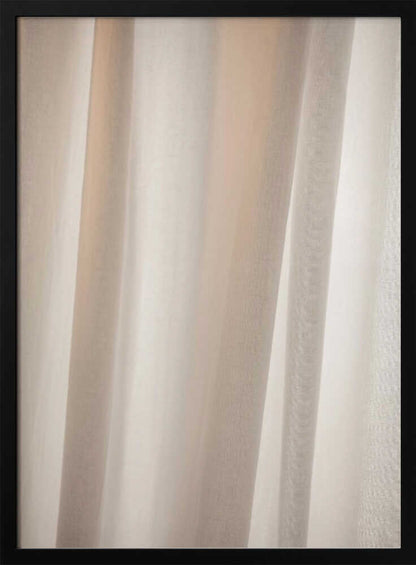 Abstract photo of light beige fabric with soft, flowing folds creating gentle shadows.